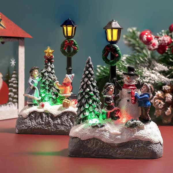 Lysende LED julelandskap lite juletrescene liten harpiks