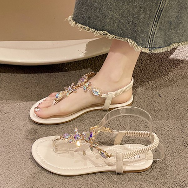 Platta sandaler för kvinnor, eleganta: sommar, bekväma, klänning, tång, platta sandaler