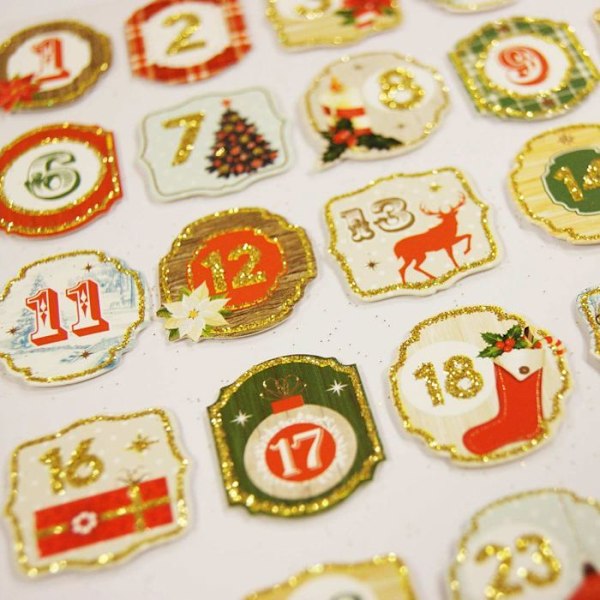 25 Adventtikalenteri tarraa - Kultainen glitter Flerfärgad