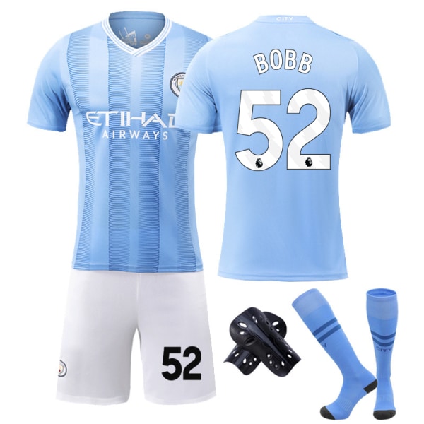 23-24 Manchester City hjemmefotballtrøye barn voksentrøye nummer 52 Oscar Bobb Legg til sokker og legg Add Socks and Pad #28