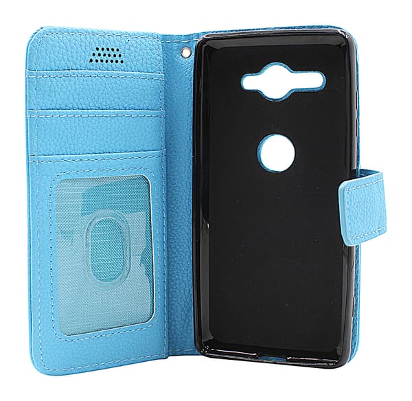 New Standcase Wallet Sony Xperia XZ2 Compact (H8324) Ljusblå