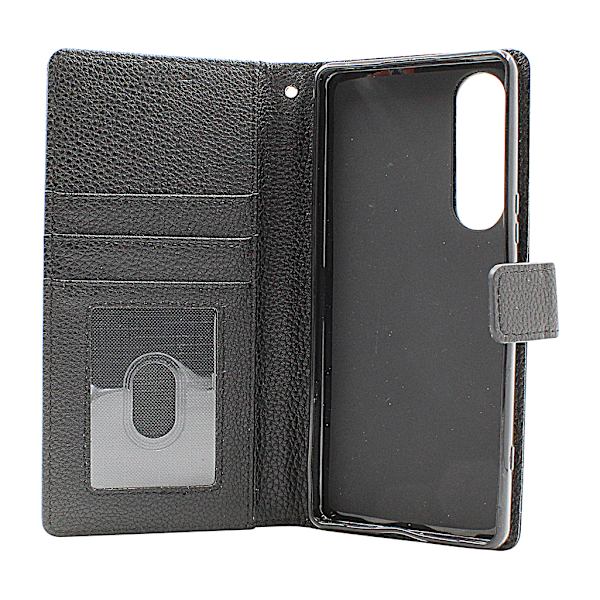 New Standcase Wallet Sony Xperia 1 V 5G (XQ-DQ72) Svart