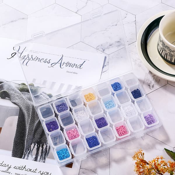 Transparent storage box with 28 compartments