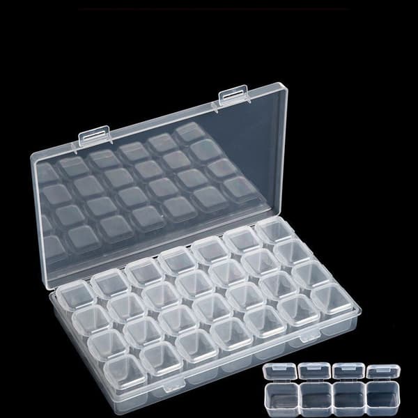 Transparent storage box with 28 compartments