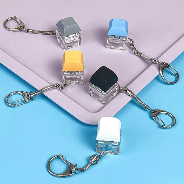 Merit +1 Muyu Decompression Keychain Keyboard Button Sormenpää Yellow one size