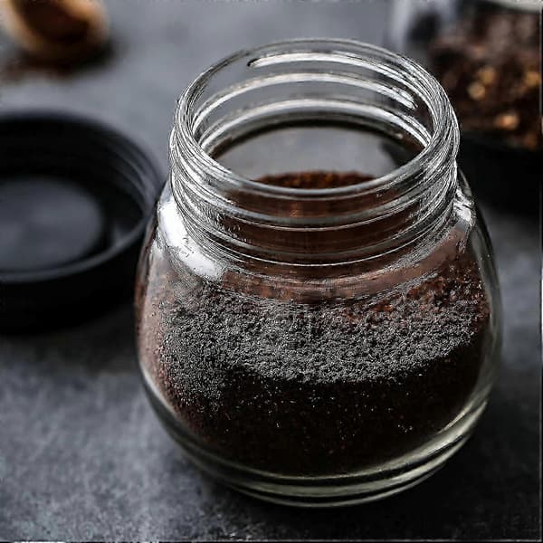 Stille manuelle kaffe- og pepperkverner laget av rustfritt stål