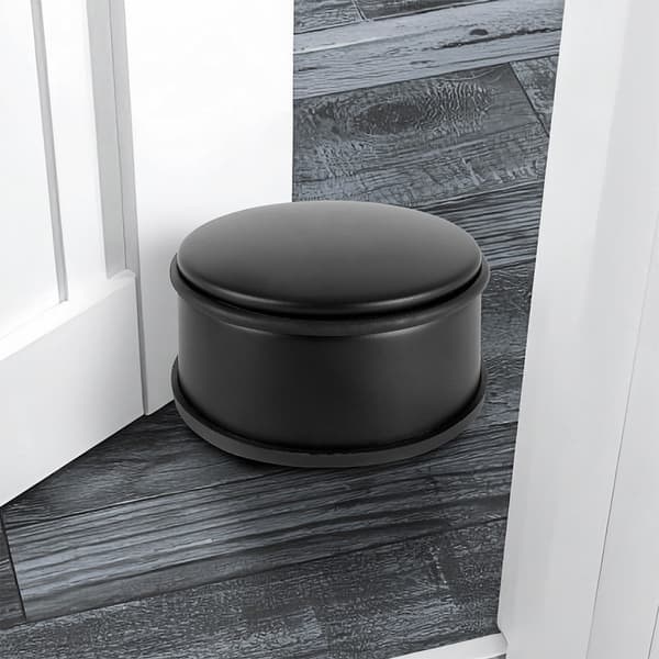 Sort metal dørstop: robust, elegant og skånsom
