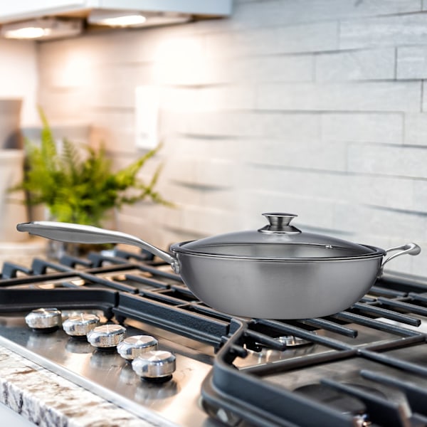 Wok i rostfritt stål med glaslock