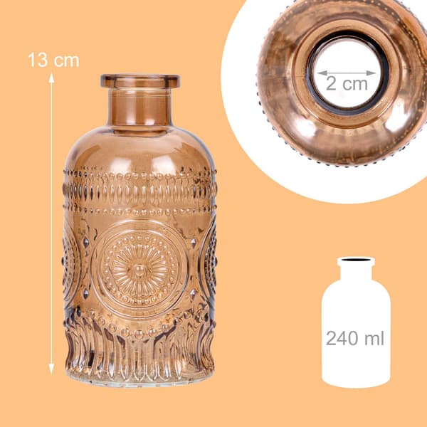 Set med 12 små glasvaser med präglad design