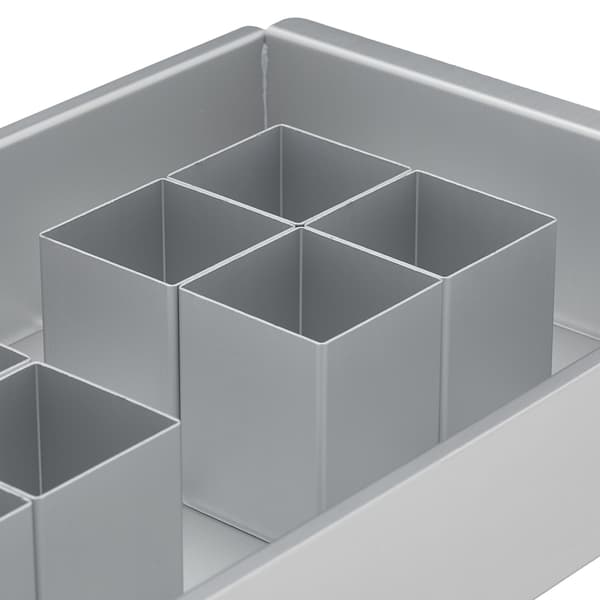 Baksidan form siffror och bokstäver