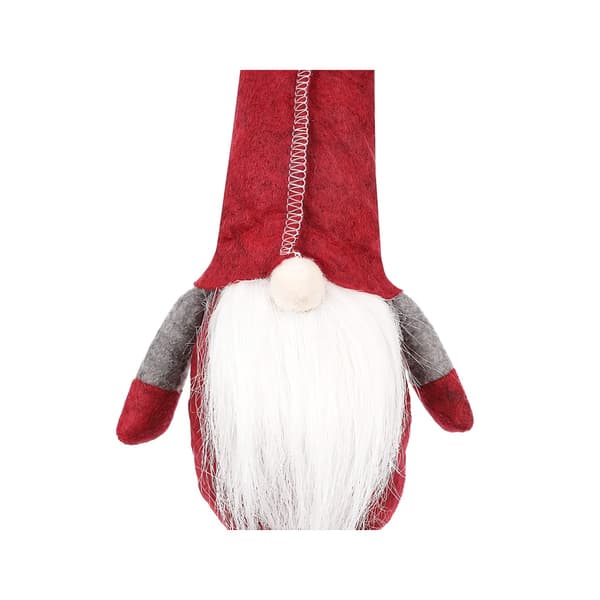 Röd sittande tomte