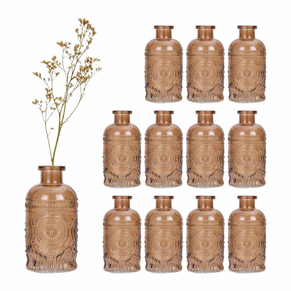 Set med 12 små glasvaser med präglad design