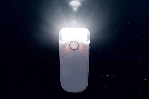 Ladattava LED-taskulamppu automaattisella valosensorilla