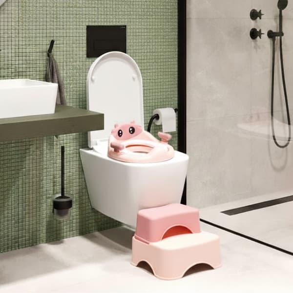WC-istuin askelmilla lapsille, pinkki