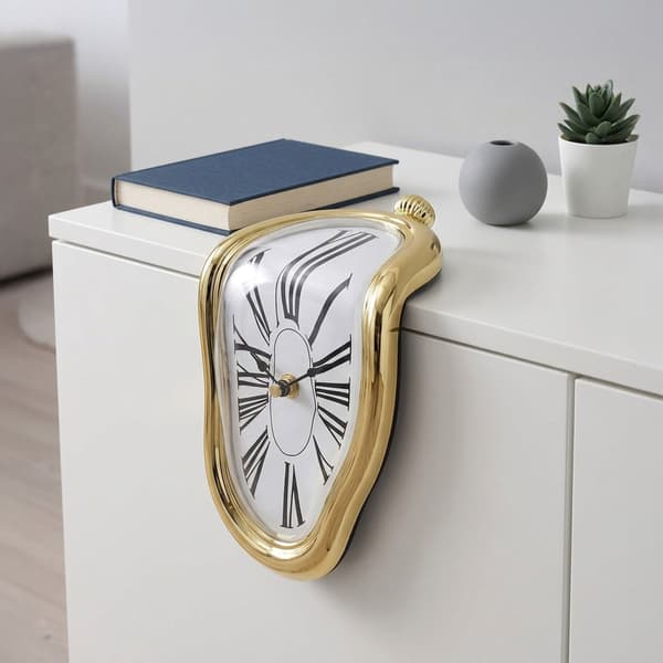 Surrealistisk guld bordur – buet Dalí design