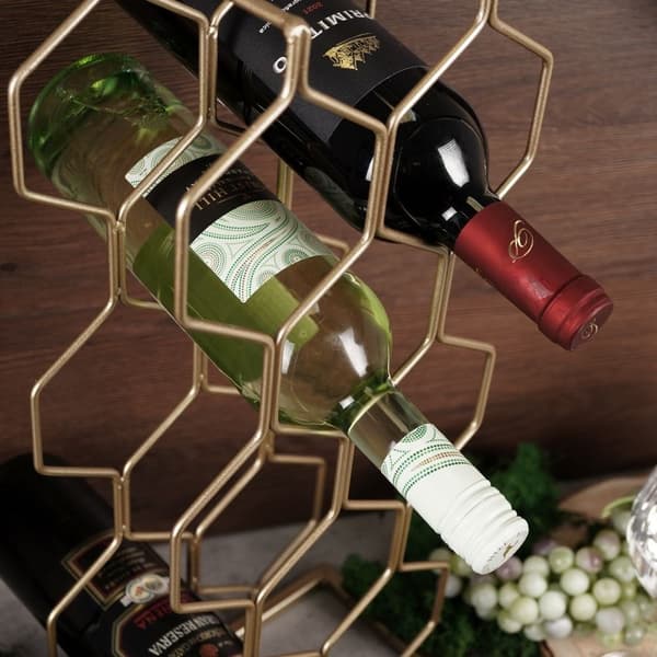 Elegant vinreol i guld til 8 flasker