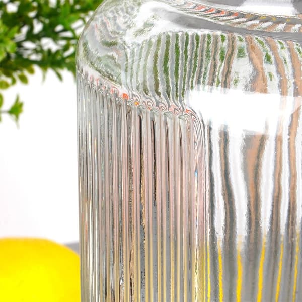 Drikkevarebeholder med hane til limonade og bål