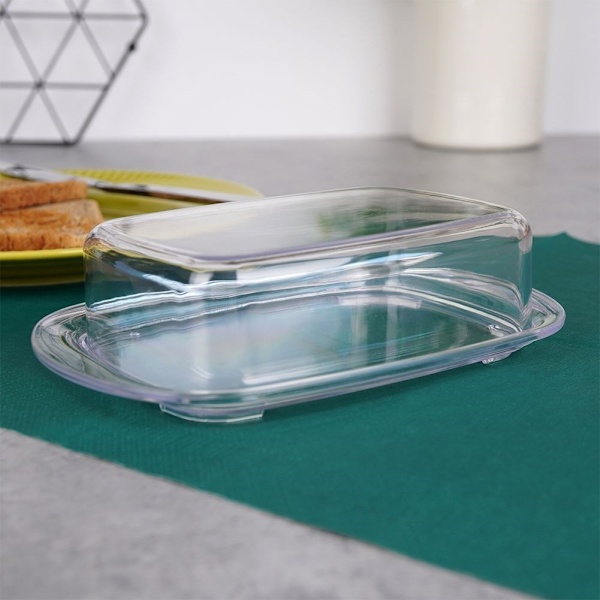 Transparent smörask för fräsch förvaring och servering