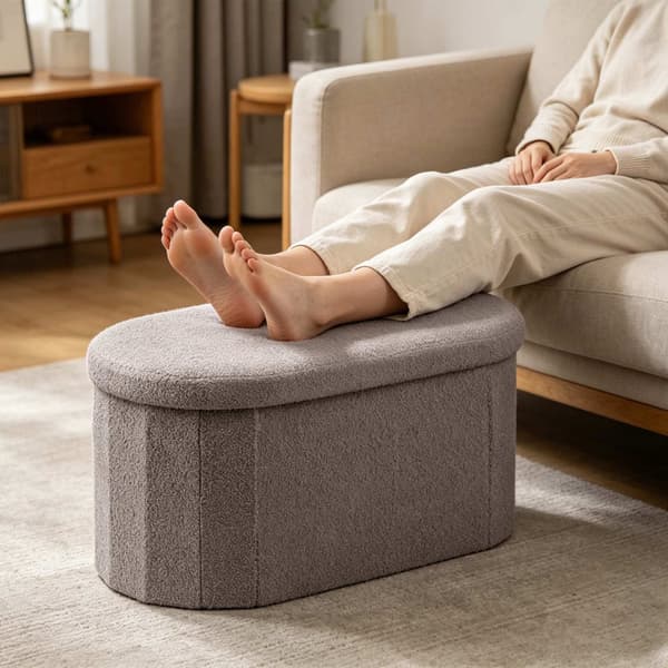 Mörkgrå förvaringsbänk i tyg, oval form