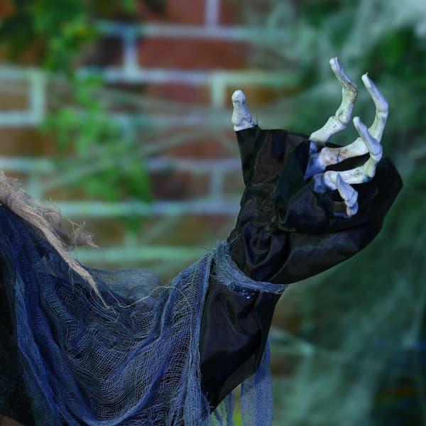 Halloween-spökdekoration med ljud- och rörelsesensor