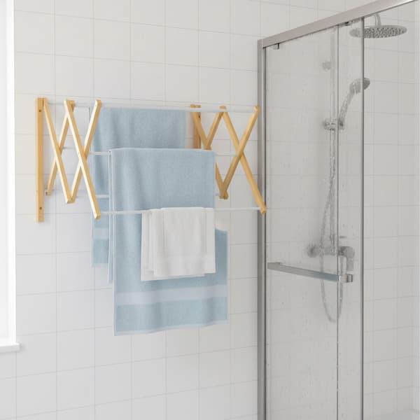 Väggmonterad torkställning i bambu, platsbesparande design