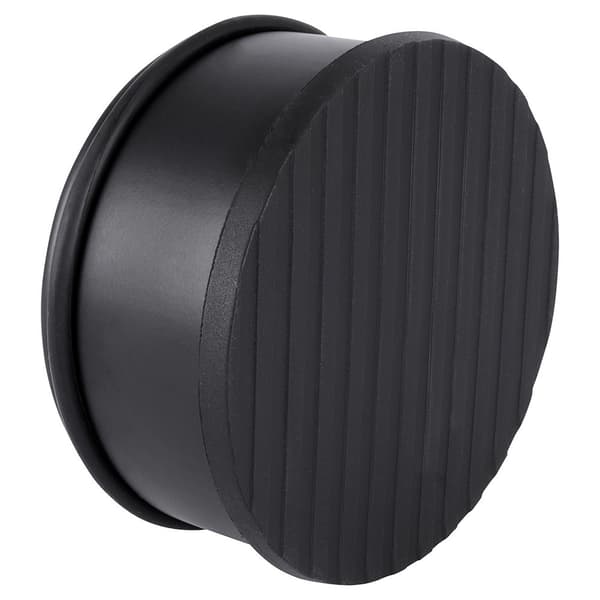 Sort metal dørstop: robust, elegant og skånsom