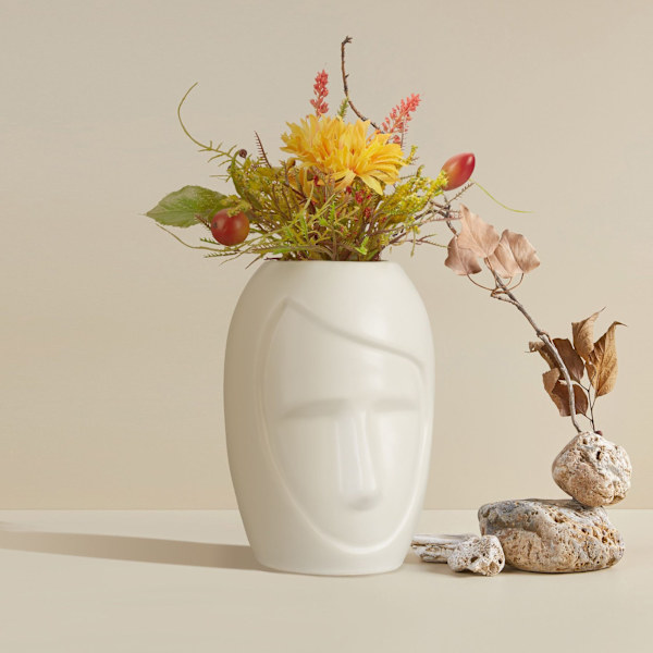 Ansigtsformet blomstervase