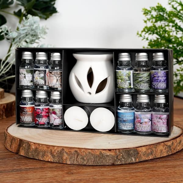 Doftspridare i vit keramik med 12 dofter och tealight-ljus