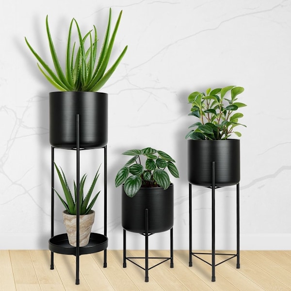 Set med 3 svarta blomkrukor på ställning för elegans