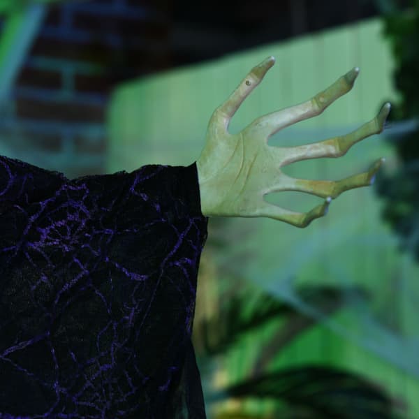 Halloween-häxdekoration med ljud- och rörelsesensor