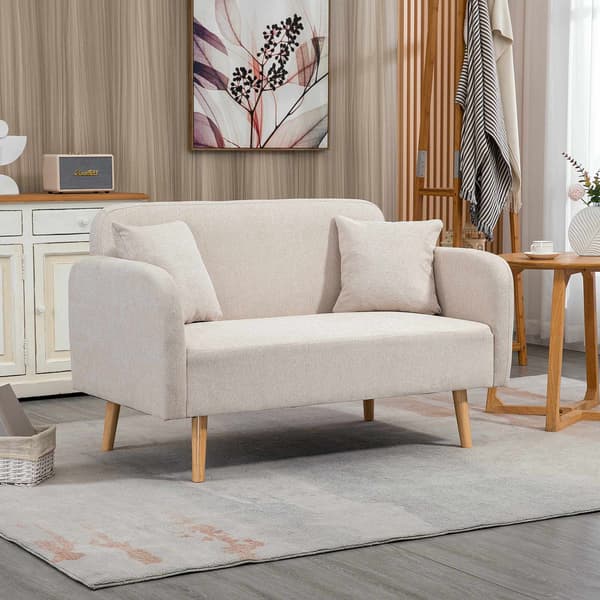 Krämfärgad 2-sitssoffa med kuddar, modern design, träben