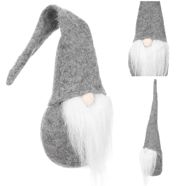 En grå stående tomte