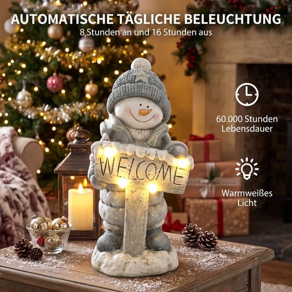 Upplyst snögubbe julstaty med välkomstskylt