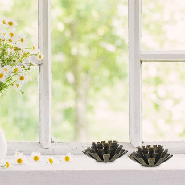 set med 2 blomformade värmeljushållare