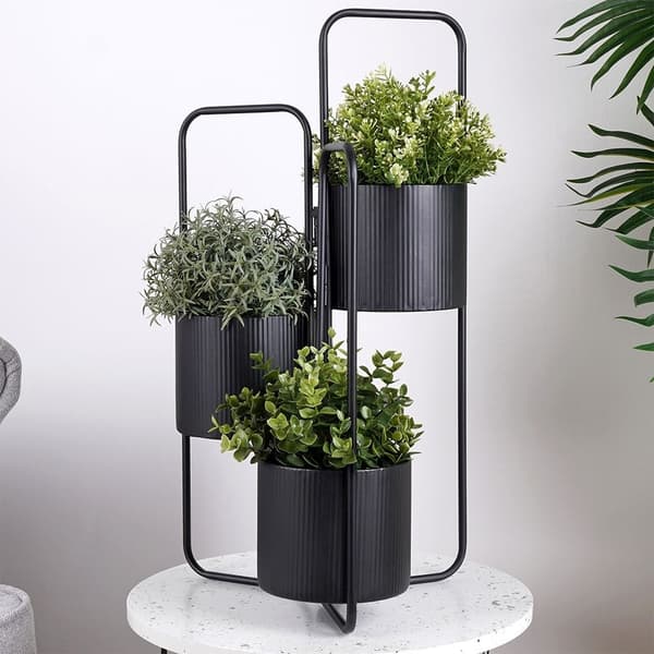 Trebenet blomsterstativ i sort metal til indendørs brug