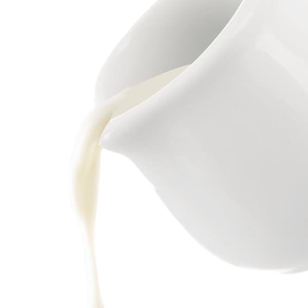 Lille porcelænskande: Perfekt til fløde og sauce