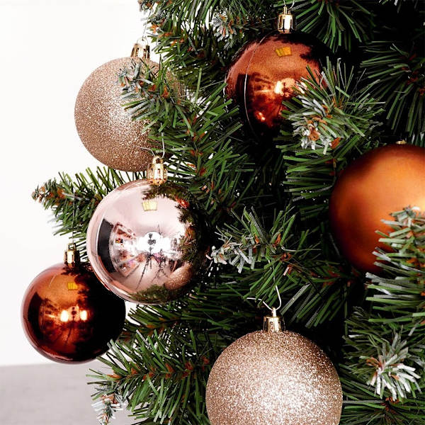 Set med 6 okrossbara julgranskulor i bärnstensfärg