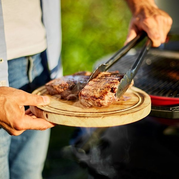 Ruostumattomasta teräksestä valmistetut keittiöpihdit lihan grillaukseen ja kääntämiseen