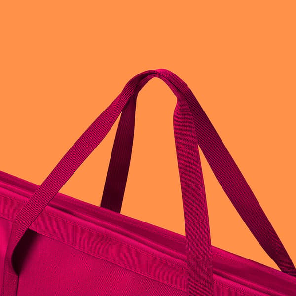 Förvaringspåse i presentpapper med nätfickor