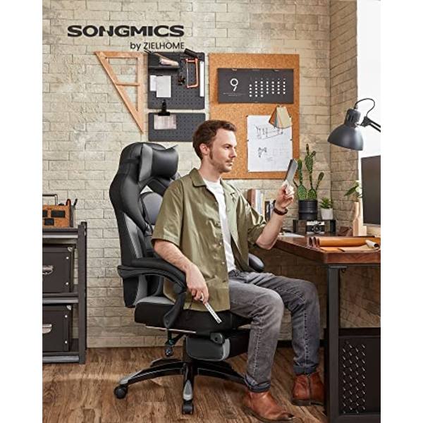 Ergonominen pelituoli, jossa ristiselän tuki ja jalkatuki