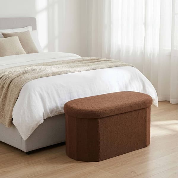Mörkbrun förvaringsbänk i tyg, oval form