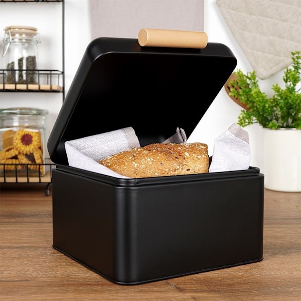 Kompakti musta metalli leipälaatikko saranoidulla kannella