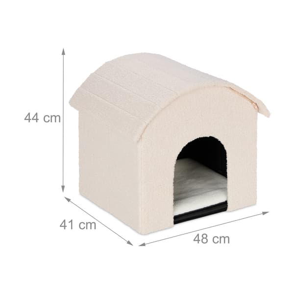 Beige kattegrav med kradseoverflade
