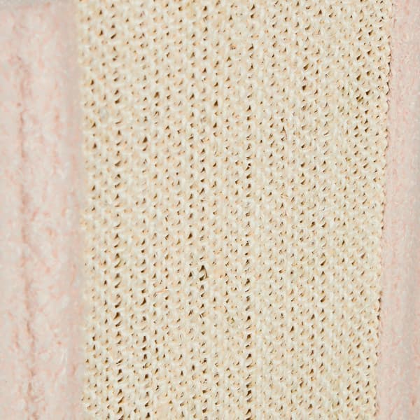Beige kattegrav med kradseoverflade