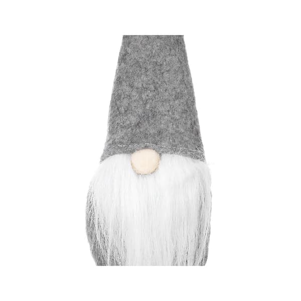 En grå stående tomte