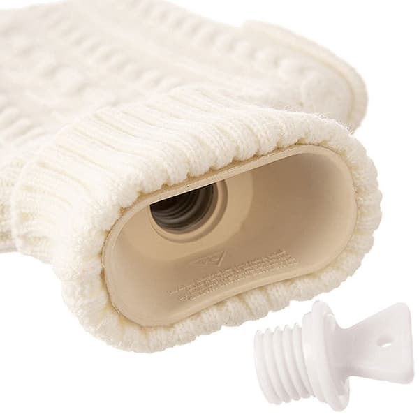 Lämmityspullo, jossa mukava neulottu beige kansi
