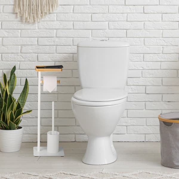 WC-harja ja -rullapidike hyllyllä