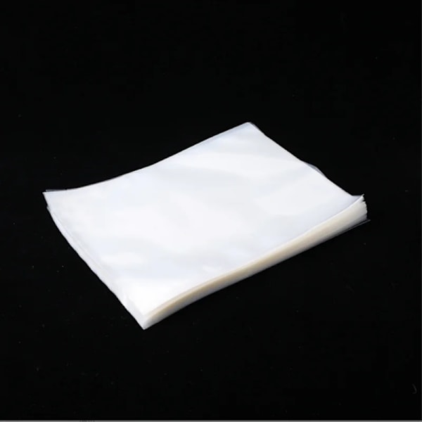 100 st/förpackning Vakuumförpacknings-påsar i PA-plast för förpackning av mat, förpackningsrulle, förpackningsmaskin, tätnings-påsar, transparenta 12X20cm Clear