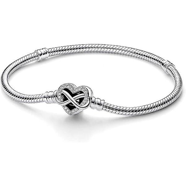 Damarmband i silver med glittrande oändlighet hjärta
