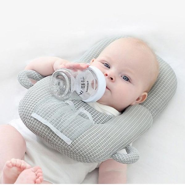 Aftagelig åndbar baby pude med flaskeholder